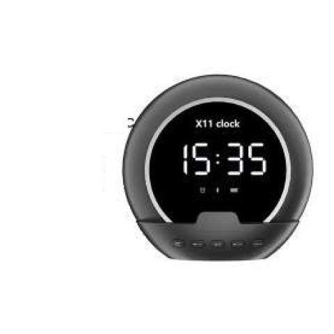 Alarm clock speaker with phone holder